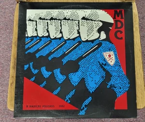 Hoja lírica MDC Millions of Dead Cops R Radical Records 1982 MDC1 ¡Gran forma! - Imagen 1 de 4