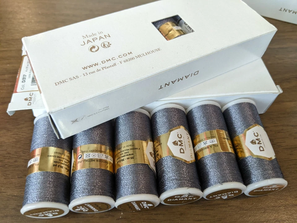 DMC Diamant Sparkle Thread 38.2yd a spool. Sold As a box of 6. Color d317 - Image 1 of 1