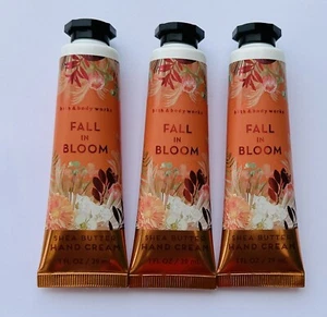 3 BATH & BODY WORKS FALL IN BLOOM HAND CREAM LOTION TRAVEL SIZE SHEA BUTTER 1 OZ - Picture 1 of 1