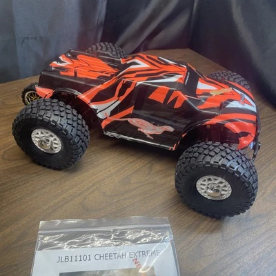 65+Mph JLB Racing Cheetah RC Basher Truck  1/10 RTR Hobby Wing 120a ESC 4s 3s - Image 1 of 4