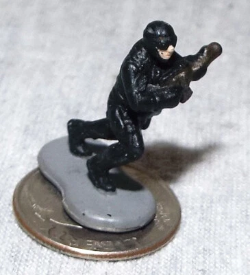 Very Small Micro Machine Figure of a Special Operations Soldier in Black # 2 - Image 1 of 3