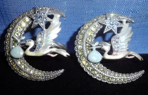 2 anillos de servilleta Kirks Folly It's A Boy - cigüeña y luna creciente - cristal/esmalte de mano - Imagen 1 de 4