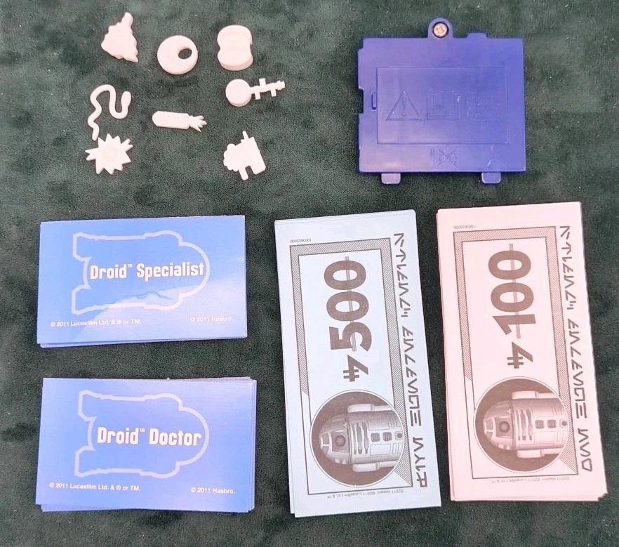 2011 Star Wars R2D2 Operation Parts, Money, Cards, And 8 Pieces - Image 1 of 1