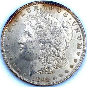 Dólar de plata Morgan 1898 USD crudo tono claro - Imagen 1 de 2
