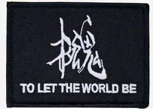 METAL GEAR SOLID 4 GAME TO LET THE WORLD BE GLOW SWAT BÜGELBILD MORAL PATCH - Bild 1 von 3