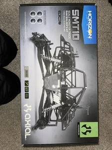 Axial SMT10 RC Monster Truck Kit ….SEALED!! Grave Digger Body And Tires - Picture 1 of 11