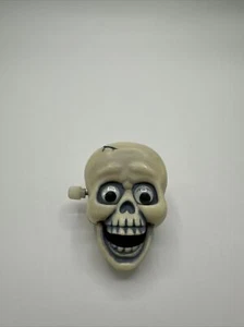 Hallmark ANSTECKNADEL Halloween animiert TOTENKOPF verrückte Augen Zähne klappern 1985 - Bild 1 von 6