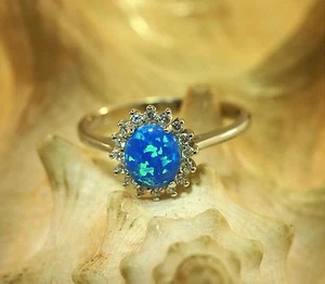 10MM RHODIUM PLATED 925 STER SILVER BLUE OVAL LAB CREATED OPAL CZ RING 4.5-12 - Picture 1 of 11