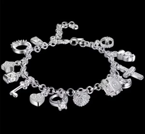 STUNNING 925 STERLING SILVER CHARM BRACELET WITH FREE POST & PACKAGING - Picture 1 of 3