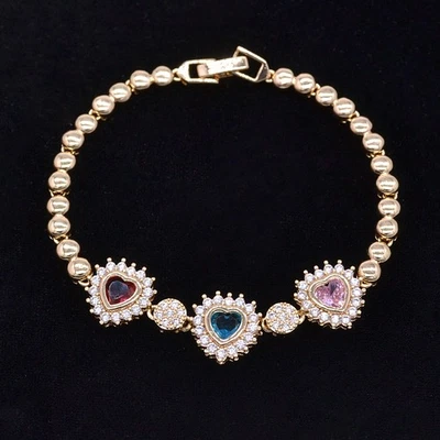 Brazalete con dije de corazón de topacio místico multicolor relleno de oro amarillo de 18 quilates para mujer Foto 1 de 2
