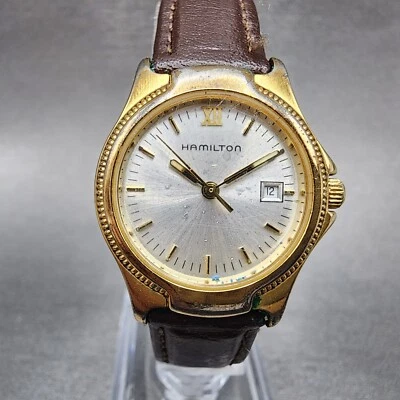 Reloj Hamilton Mujer 26mm Esfera Plateada Tono Dorado Fecha Redondo 8460 PIEZAS Foto 1 de 4