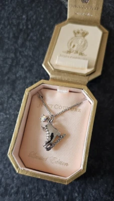 JUICY COUTURE Vintage Silver Ice Figure Skate Charm Necklace 2011 Limited Ed - Image 1 of 4