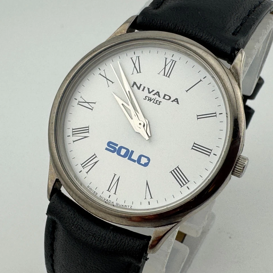 Reloj de Cuarzo Suizo Nivada SOLO Logo Hombre 30m Plata Acero Cuero Batería Nueva Foto 1 de 4