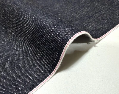 13.5 oz indigo "kibata" denim fabric with pink selvage by the yard - Image 1 of 4