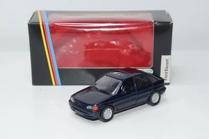 B23 1:43 SCHABAK 1090 FORD ESCORT 5 PORTE BLU METALLIZZATO NUOVO CON SCATOLA - Foto 1 di 18
