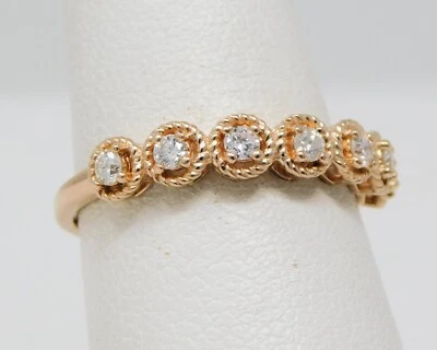 14 kt Rose Gold 7 Stone Halo Style Diamond Half Band Wedding Ring Size 7.5 B6354 - Image 1 of 4