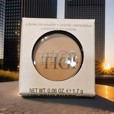 Corrector en crema TIGI Professional Cosmetics, ligero, 0,06 OZ cobertura de nueva construcción  Foto 1 de 4