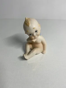Vintage Kewpie Piano Baby Figurine Sitting Hand on Face Japan - Picture 1 of 2
