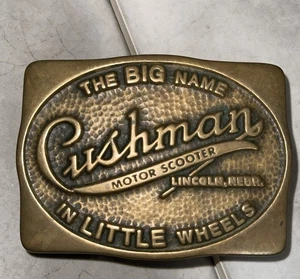 Scooter Cushman raro de colección Anacortes Hebilla de cinturón campo petrolífero de latón 1984 EE. UU. - Imagen 1 de 2