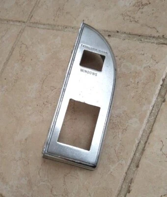 1961 1962 GM CADILLAC DEVILLE FRONT DRIVERS DOOR POWER WINDOW CONTROL BEZEL - Image 1 of 2