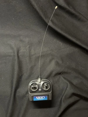 Nikko RC Systems 49MHz 2 Channel Full Function Remote Control FCC ID: CVTTN7720H - Image 1 of 4