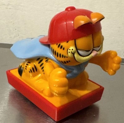 Collectible Vintage 1981 Playmates Garfield The Cat With Blue Cape Pullback Toy - Image 1 of 4