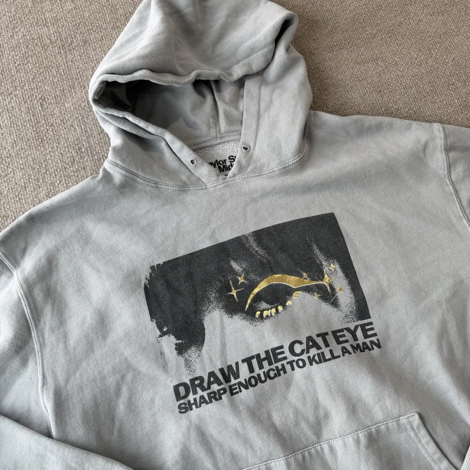 Sudadera con Capucha Taylor Swift Midnights Dibuja el Ojo de Gato Gris Adulto Grande Foto 1 de 4