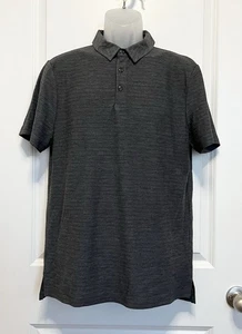 Polo a rayas negras para hombre talla mediana - todo en movimiento - Imagen 1 de 5