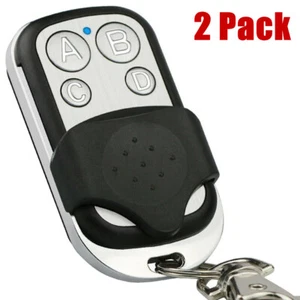 Control remoto abridor garaje puerta 4 botones código fijo universal 433 MHz 2 piezas - Imagen 1 de 11