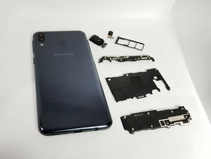 Cubierta de batería de cámara de piezas internas originales para Samsung M20 2019 M205 *genuina* - Imagen 1 de 3