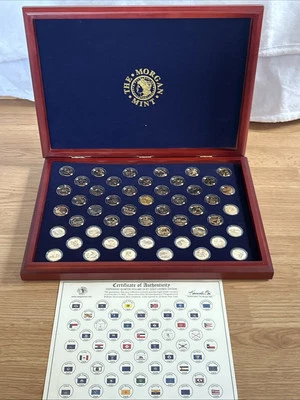 The Morgan Mint Statehood Quarter Dollars 24 KT. Gold Layered Edition Complete - Image 1 of 4