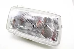 VW Polo Mk3 right headlight NOS Hella 1AF962489-121 - Picture 1 of 5