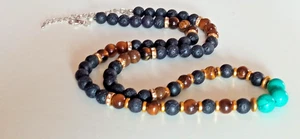 Collana in tondi grani in occhio di tigre pietra lavica e turchese con strass - Imagen 1 de 13