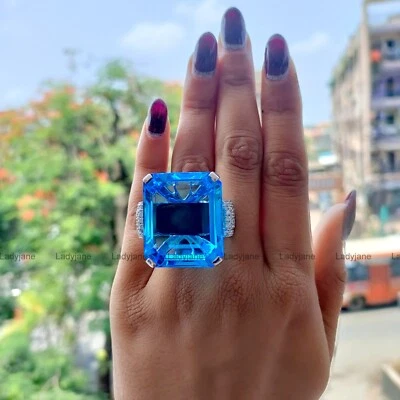 Attractive Large Emerald Shape Simulated Blue Tanzanite Women's Wedding Ring - Image 1 of 4