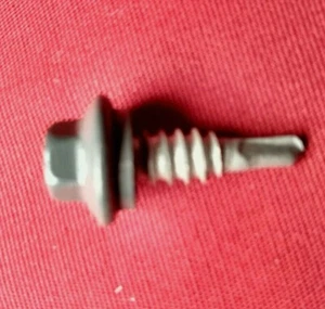 Diapositiva de 1/4". Tornillo de regazo para techos/revestimientos de metal carbón azul - Imagen 1 de 5