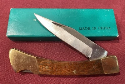 Cuchillo de 4” de acero inoxidable con hoja de bloqueo plegable vintage de 3” con mango de madera de latón usado en excelente estado Foto 1 de 4