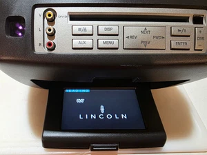 Reproductor de DVD Lincoln Navigator Overhead 2004-2006 carbón probado - Imagen 1 de 21