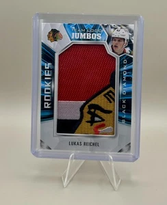 2022-23 UD Black Diamond #RTL-LR Lukas Reichel Rookie Team Logo Jumbo Patches - Bild 1 von 2