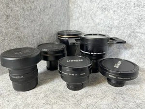 Lote de 6 lentes Nikon, WC-E63, TC-E2, FC-E8, WC-E68, ES-E28, TC-E3ED con bolsa sin probar - Imagen 1 de 16