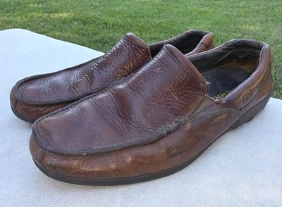 Zapatos informales mocasines sin cordones de cuero marrón Merrell para hombre Foto 1 de 4