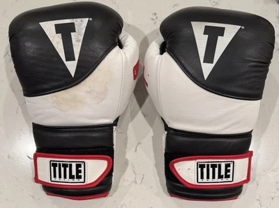 Guantes de boxeo de entrenamiento con suspenso de gel de boxeo TITLE 16 onzas Foto 1 de 3