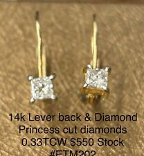 One pair of 14k yellow gold Lever back Diamond Princess cut diamond earrings