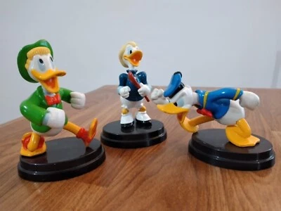 DISNEY FIGURE IN 3D PAPERINO, GASTONE, NONNA PAPERA 3 STATUINE DA COLLEZIONE - Immagine 1 di 4