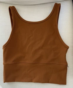 Camiseta sin mangas Lululemon Power Pivot usada en excelente estado costilla cobre marrón mantequilla talla 6 - Imagen 1 de 7