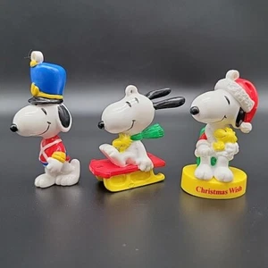 Lot of 3 Snoopy Holiday Ornaments PVC Christmas Figures Peanuts Gang Toy Soldier - Bild 1 von 10