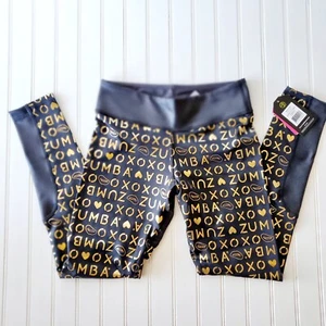 Zumba Spicy XO Leggings alla caviglia audaci nero/oro logo piccolo (cuore posteriore) - Foto 1 di 3