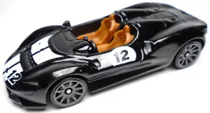 2022 HOT WHEELS MCLAREN ELVA #12 BLACK 2 3/4" DIECAST RACE CAR W/ WHITE & BROWN - Imagen 1 de 6