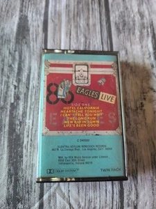 EAGLES-LIVE ‘86-CASSETTE TAPE- 1980 ELEKTRA/ASYLUM RECORDS-RARE BLUE-NM-FAST SH - Picture 1 of 3