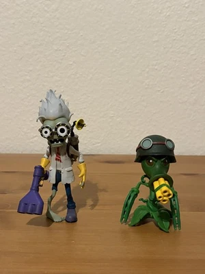 Plantas Vs Zombies GATLING GUISANTE Y CIENTÍFICO ZOMBIE Figura DST Juguetes Raro Foto 1 de 4