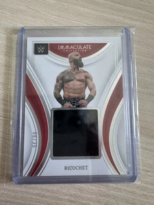 2023 Panini Immaculate Collection WWE - Remarkable Memorabilia Ricochet #08/35 - Bild 1 von 3